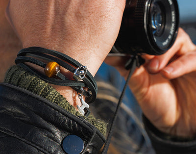 Leather bracelet with beads on model taking pictures