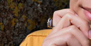 model wearing the Troll agate bead on a ring