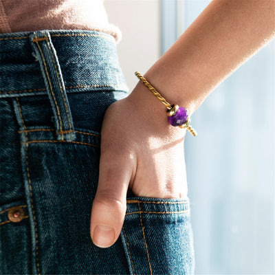 Gedrehte Gold Armspange mit Amethyst